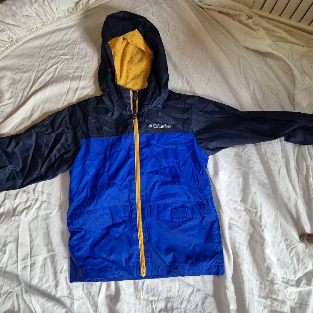 Kids Columbia jacket with fleece interior.